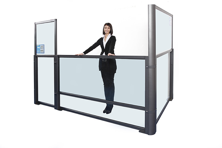 woman in black suit showing how to lower a glass divider